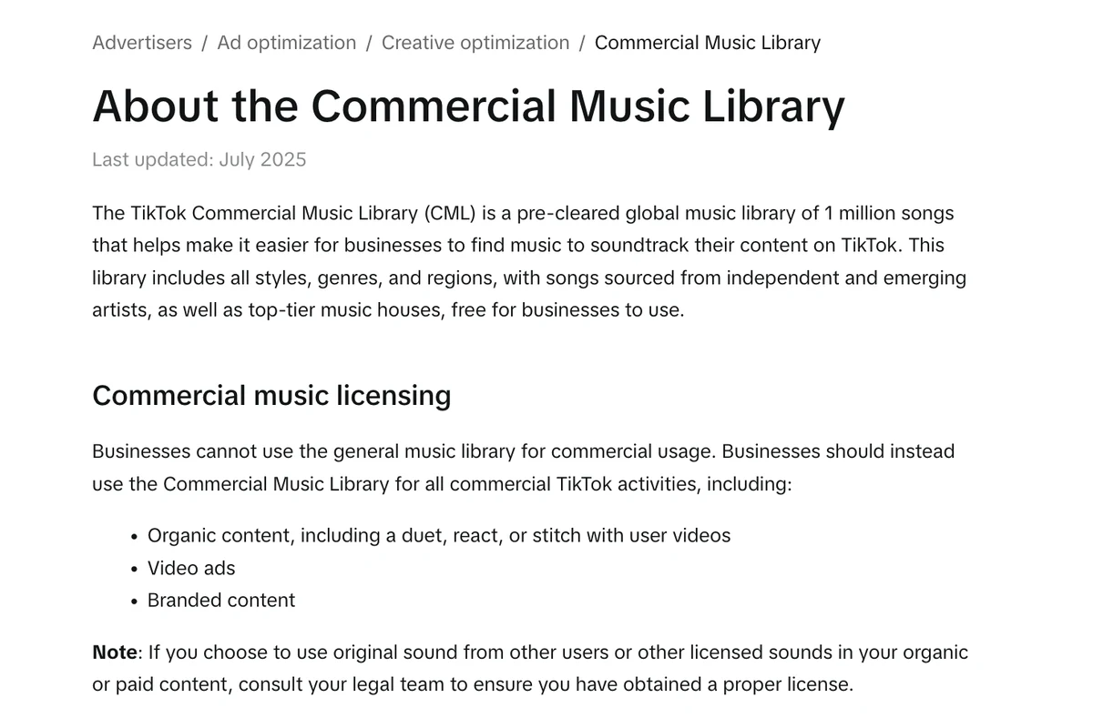 TikTok for Business help page About the Commercial Music Library, last updated July 2025, with the section Commercial music licensing stating that businesses cannot use the general music library for commercial usage, and listing organic content, video ads and branded content